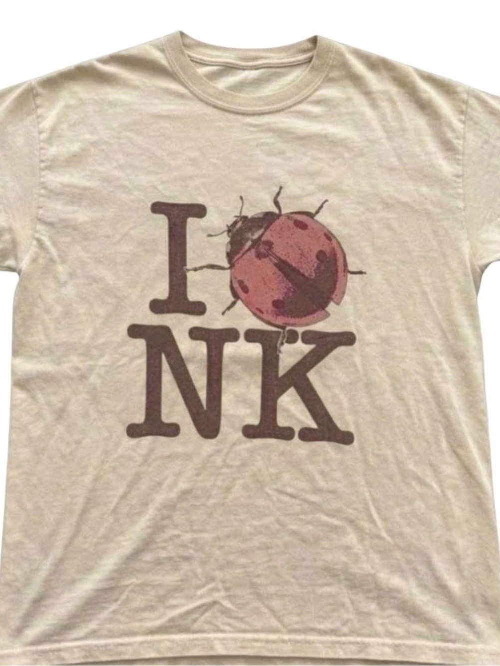 Cream Graphic Tee with Pink Ladybug Print